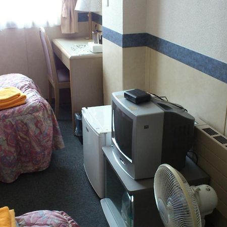 Business Hotel Motonakano Tomakomai Bagian luar foto