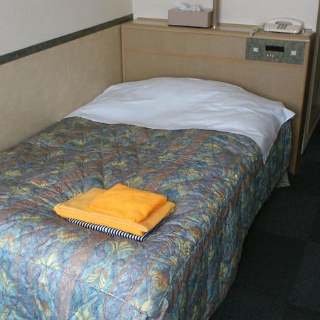 Business Hotel Motonakano Tomakomai Bagian luar foto