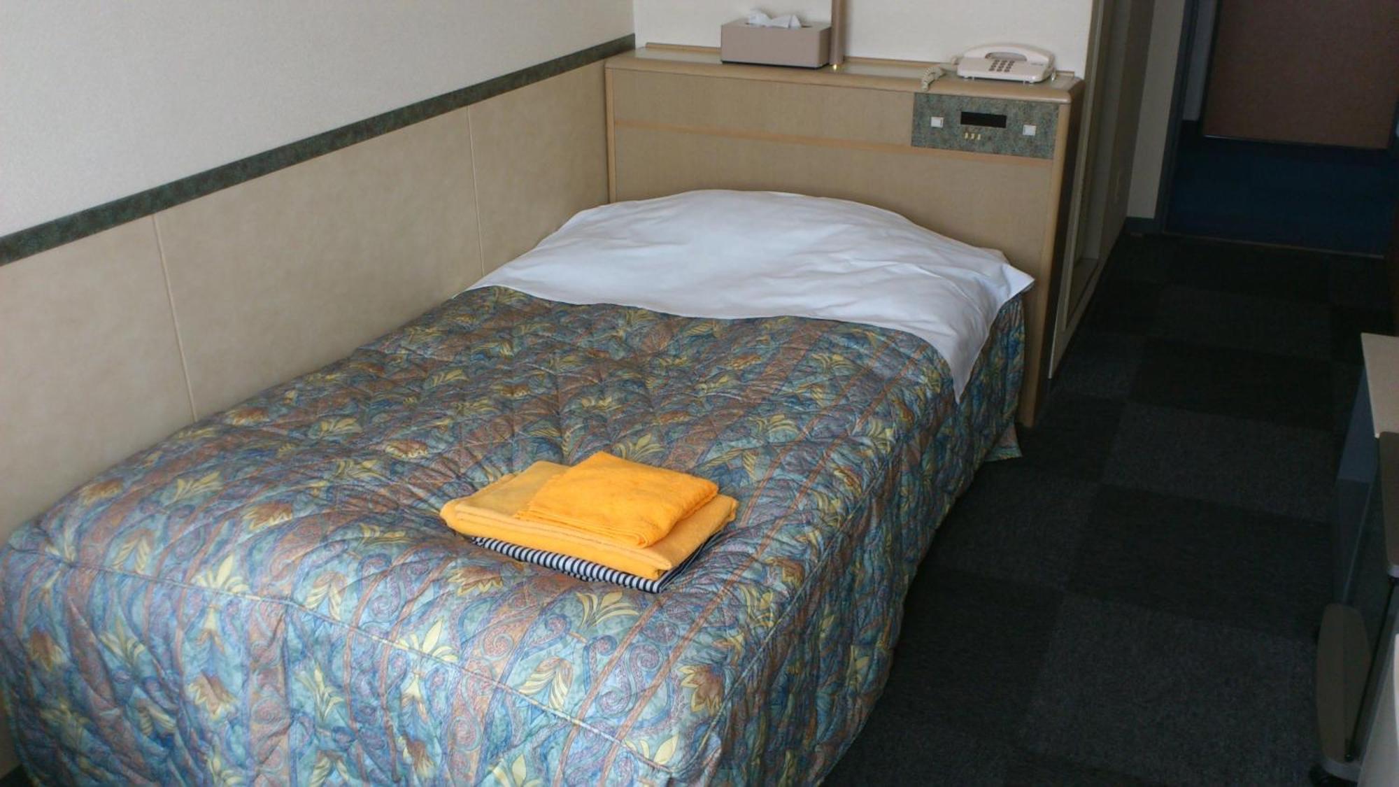 Business Hotel Motonakano Tomakomai Bagian luar foto