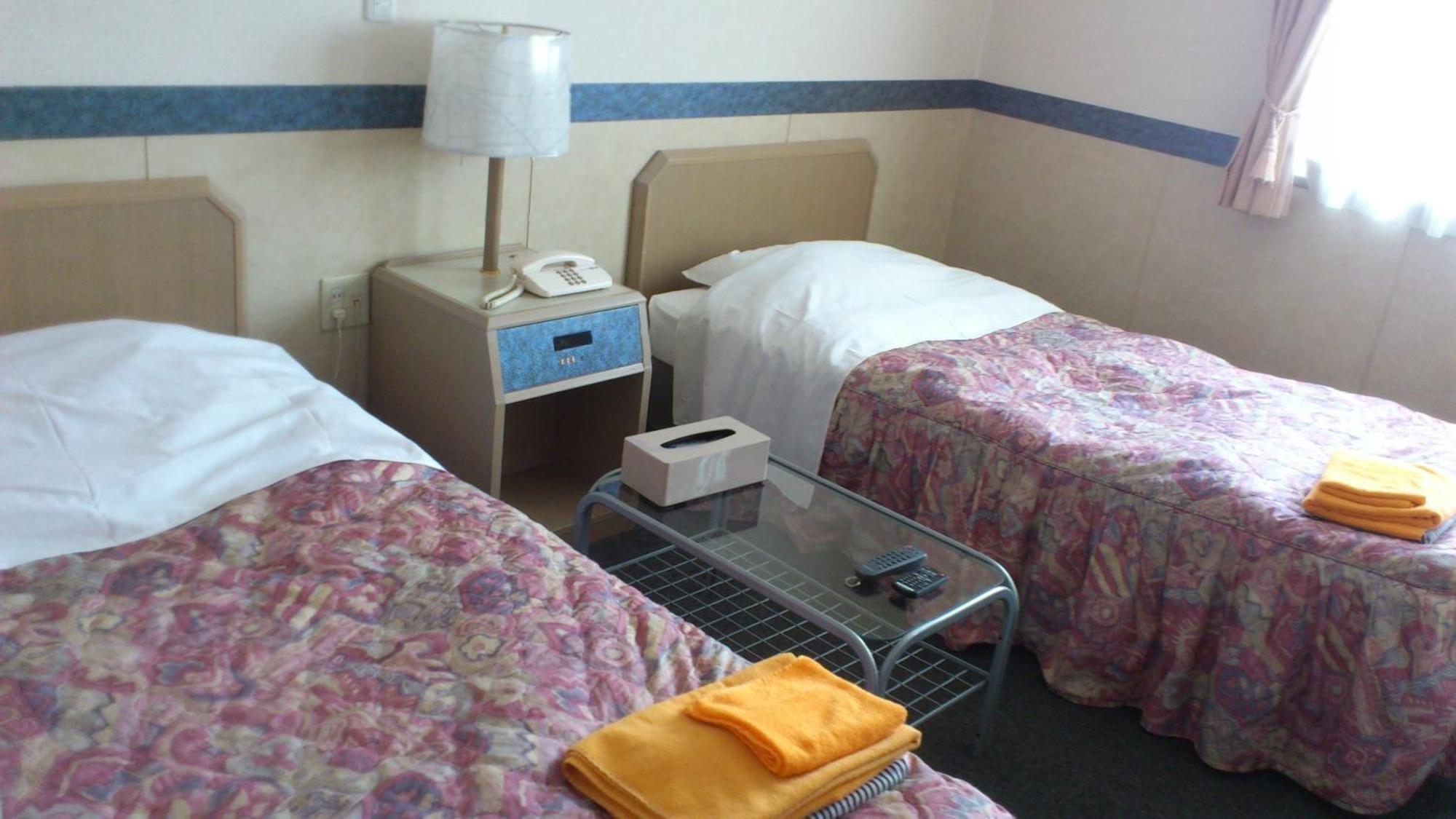 Business Hotel Motonakano Tomakomai Bagian luar foto